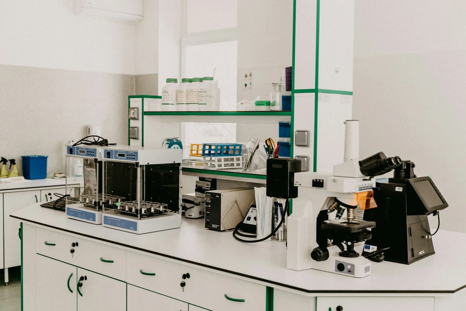Analytical chemist reviewing laboratory documentation for supplier qualification
