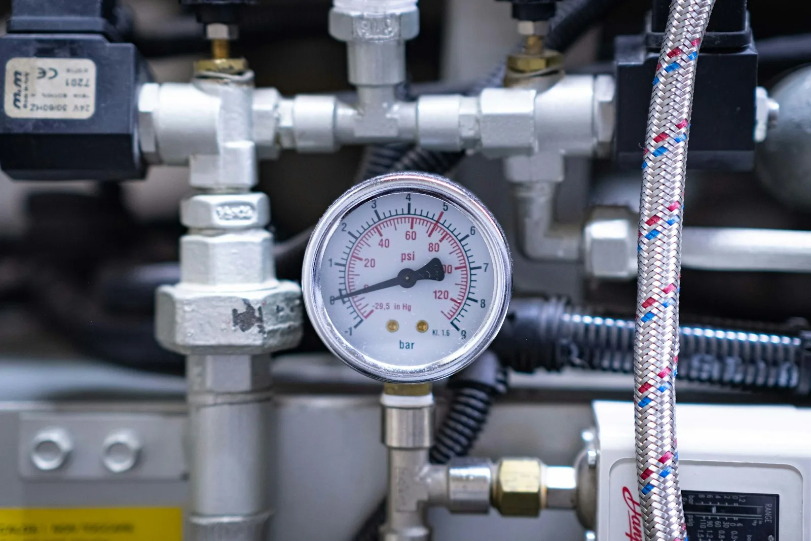 Pressure gauge and control panel on a laboratory hydrogenation reactor